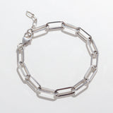 Paperclip bracelet in sterling silver on white background